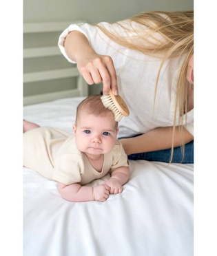 Poofi® relaxing baby brush with natural bristles