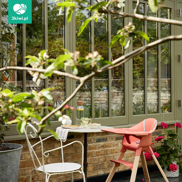 Stokke® Clikk™ ergonomic baby chair Natural + Sunny Coral